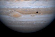 Io Orbiting Jupiter
